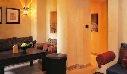 Bab Al Shams Desert Resort and Spa Dubai living room with sofas and coffee table