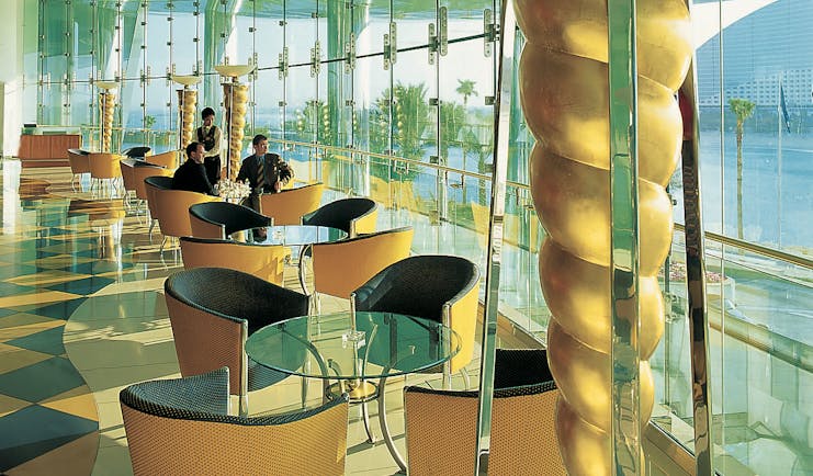 Burj Al Arab Dubai atrium dining area with panoramic sea views