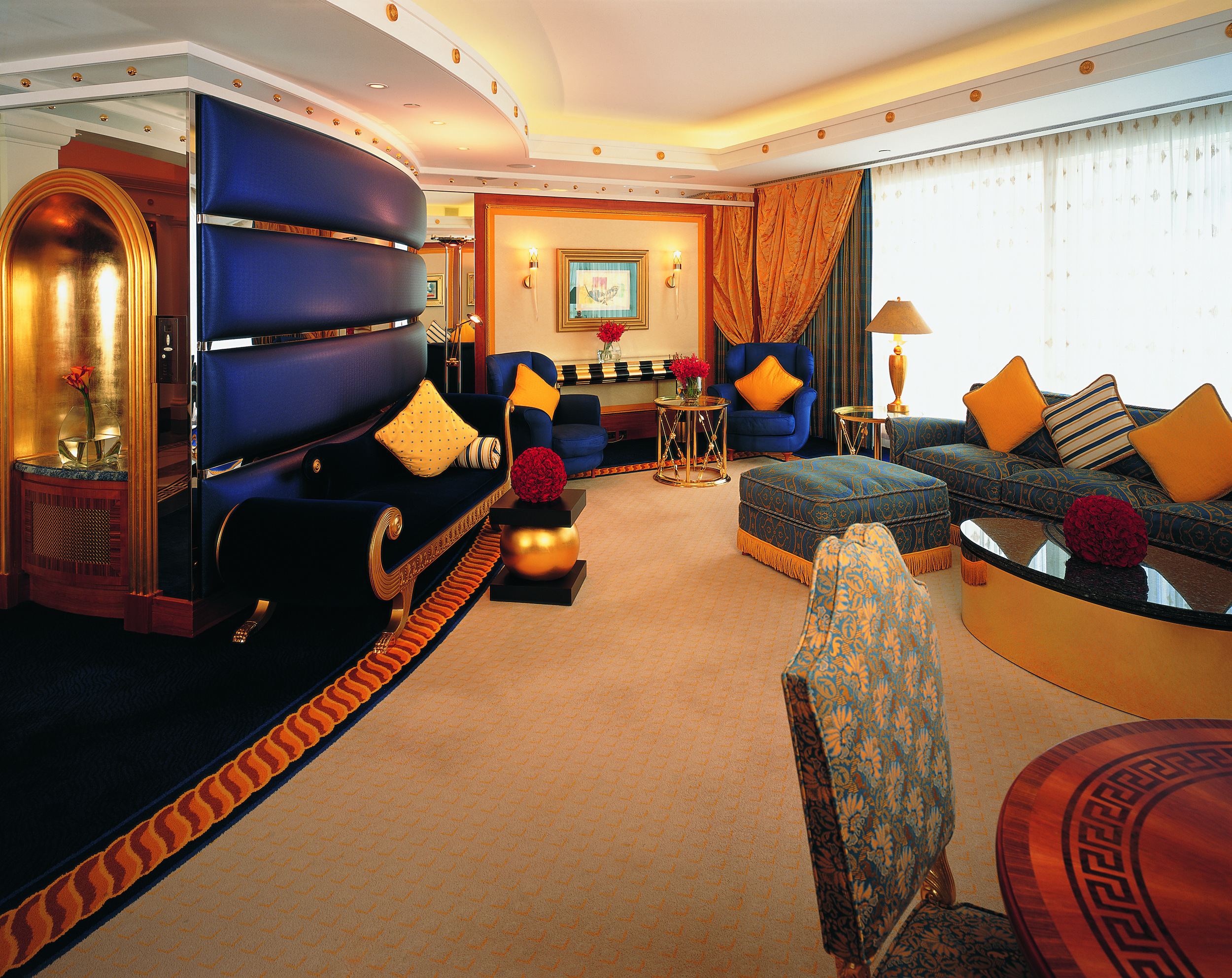 Burj Al Arab Dubai deluxe suite lounge with chaise longue and sofa