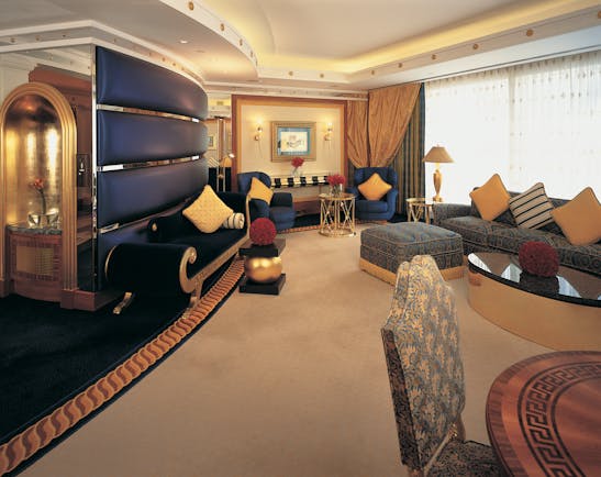 Burj Al Arab Dubai deluxe suite lounge with chaise longue and sofa