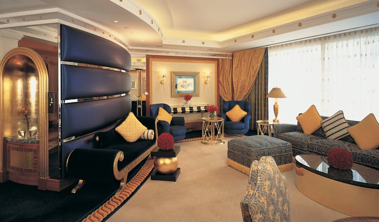 Burj Al Arab Dubai deluxe suite lounge with chaise longue and sofa