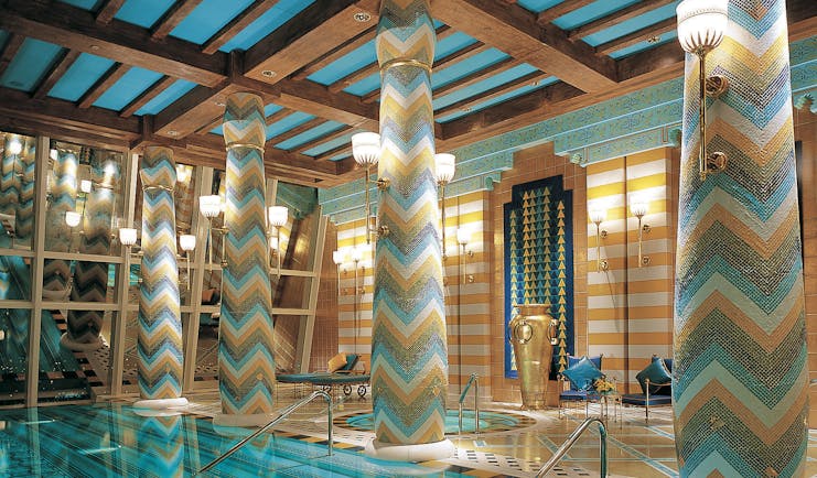 Burj Al Arab Dubai spa pool with mosaic columns and chairs