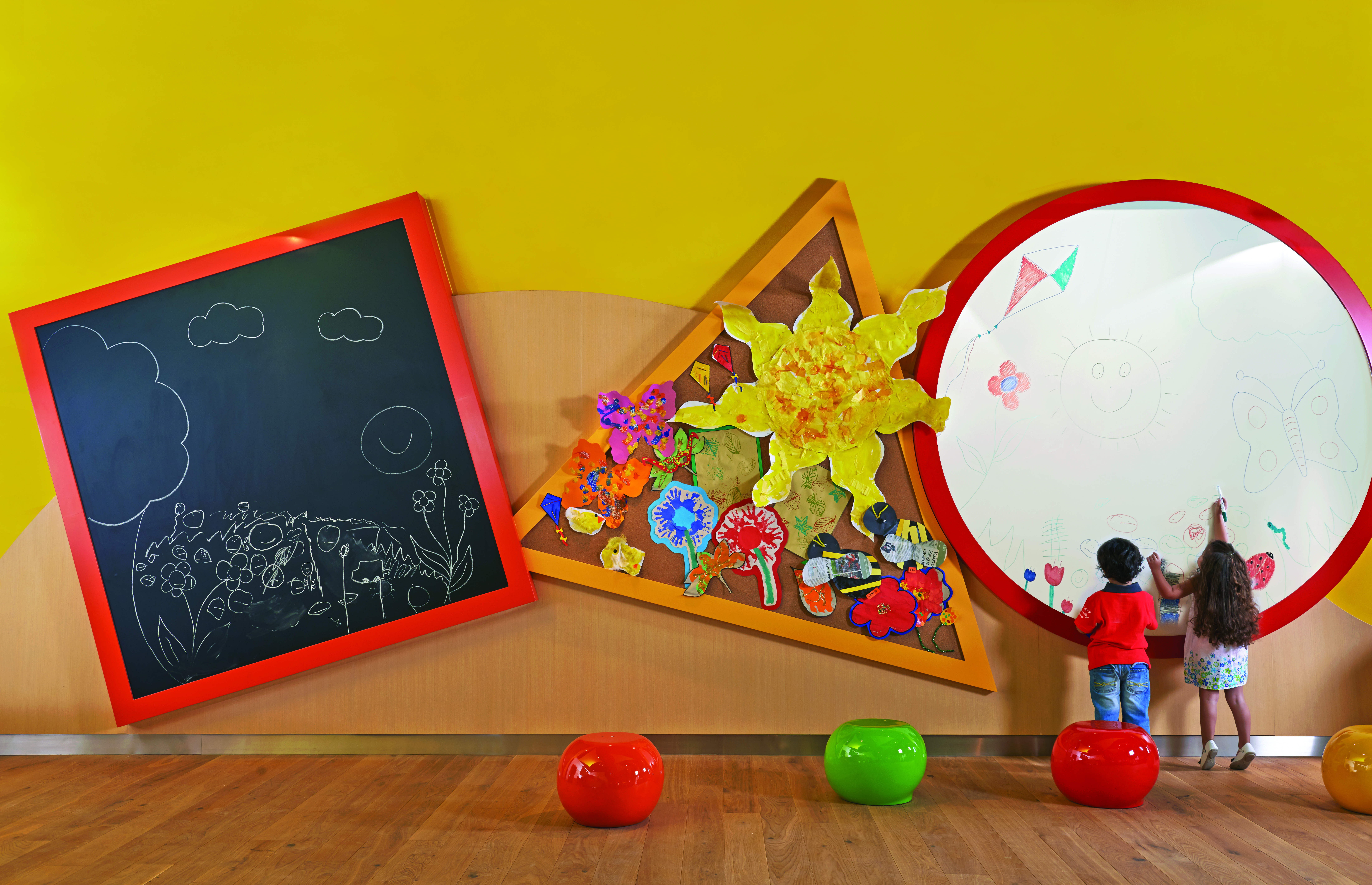 Fairmont the Palm Dubai kids club children drawing on whiteboard