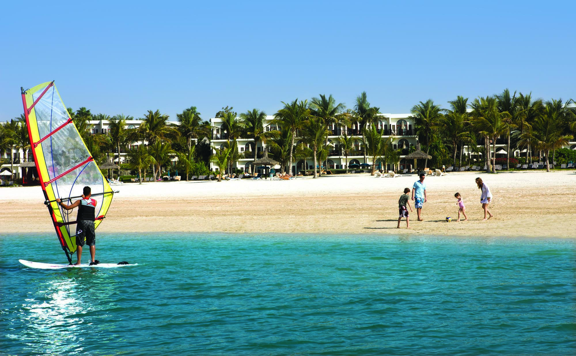 Palm Tree Court Jebel Ali Dubai windsurfing man near beach