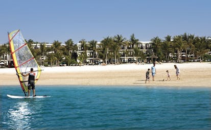 Palm Tree Court Jebel Ali Dubai windsurfing man near beach