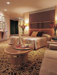 The Jumeirah Beach Hotel Dubai bedroom chairs and flowers