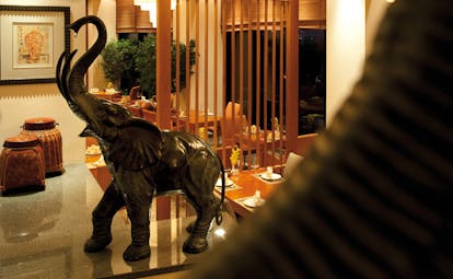 Le Royal Meridien Beach Resort and Spa Dubai Fusion dining room with elephant statue