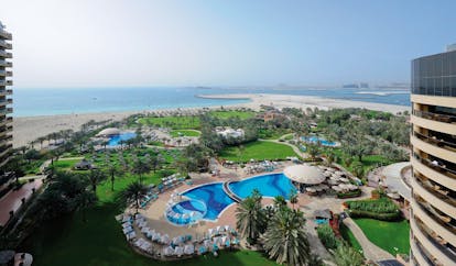 Le Royal Meridien Beach Resort and Spa Dubai gardens aerial view of gardens pool and sea