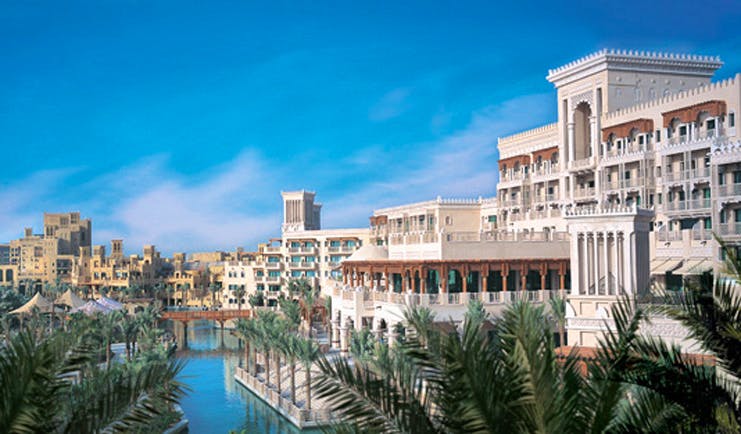 Madinat Jumeirah Dubai exterior building with balconies and view of Burj Al Arab