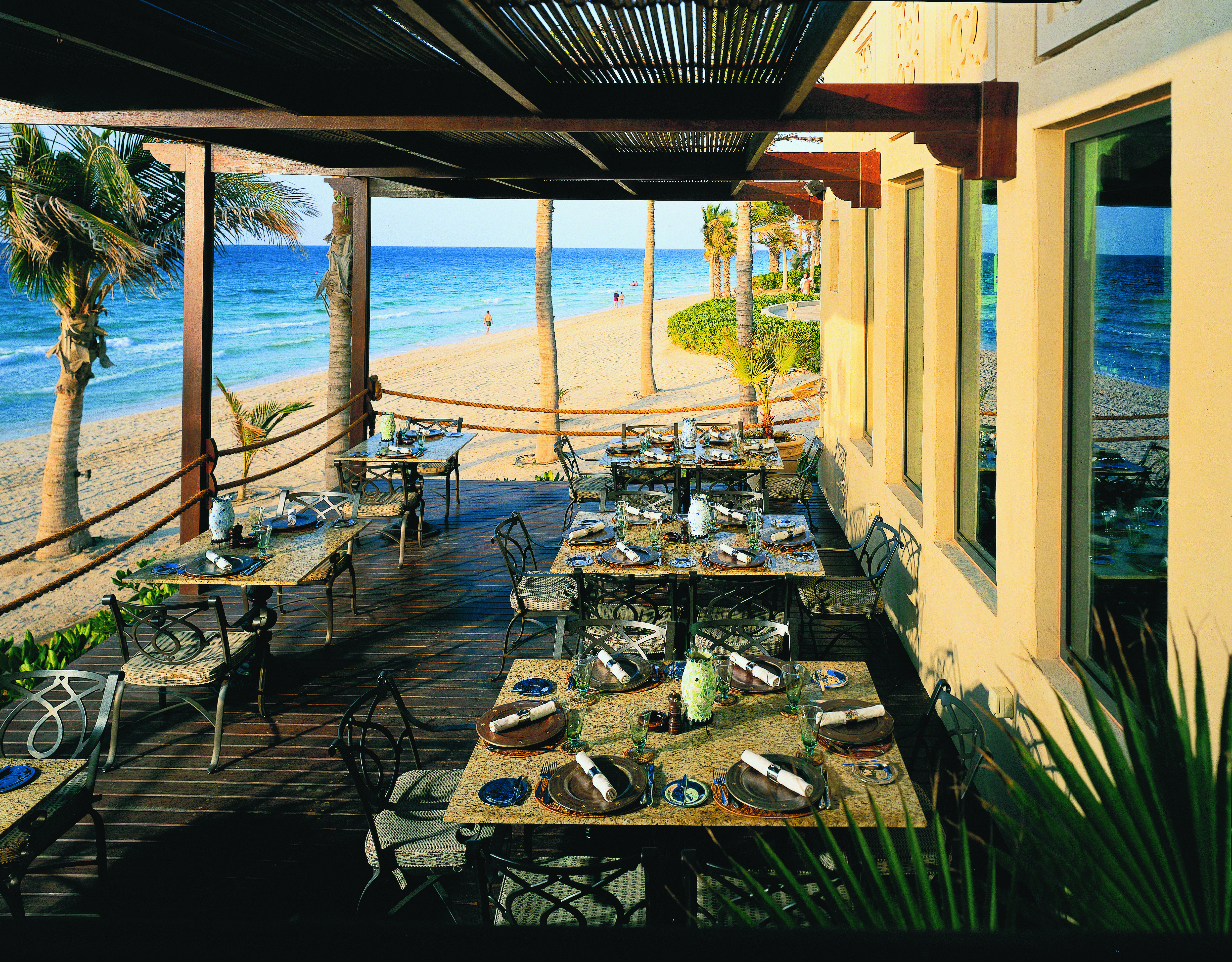 One and Only Royal Mirage Dubai beach bar outdoor dining area on deck next to the beach