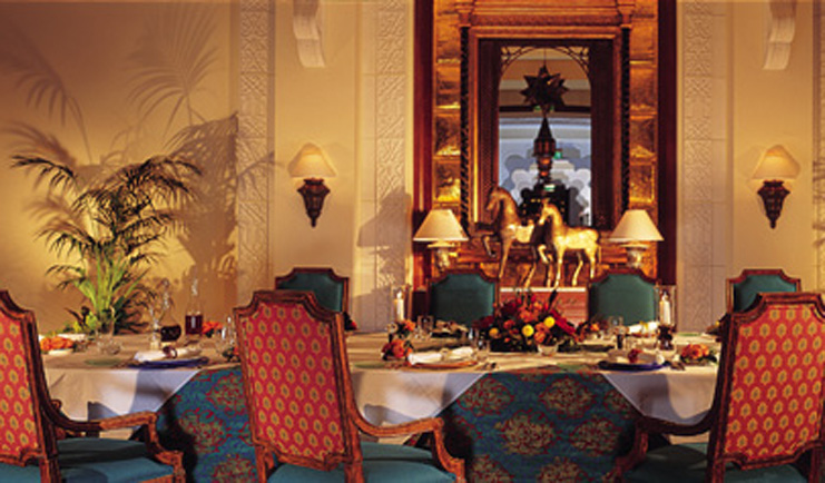 One and Only Royal Mirage Dubai dining room with patterned chairs and tablecloths