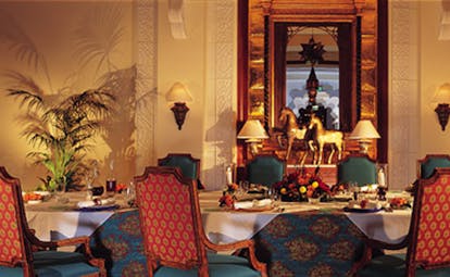 One and Only Royal Mirage Dubai dining room with patterned chairs and tablecloths