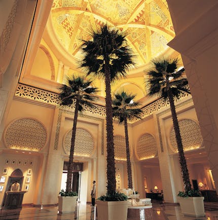 One and Only Royal Mirage Dubai lobby with traditional Arabic decorative features and palms