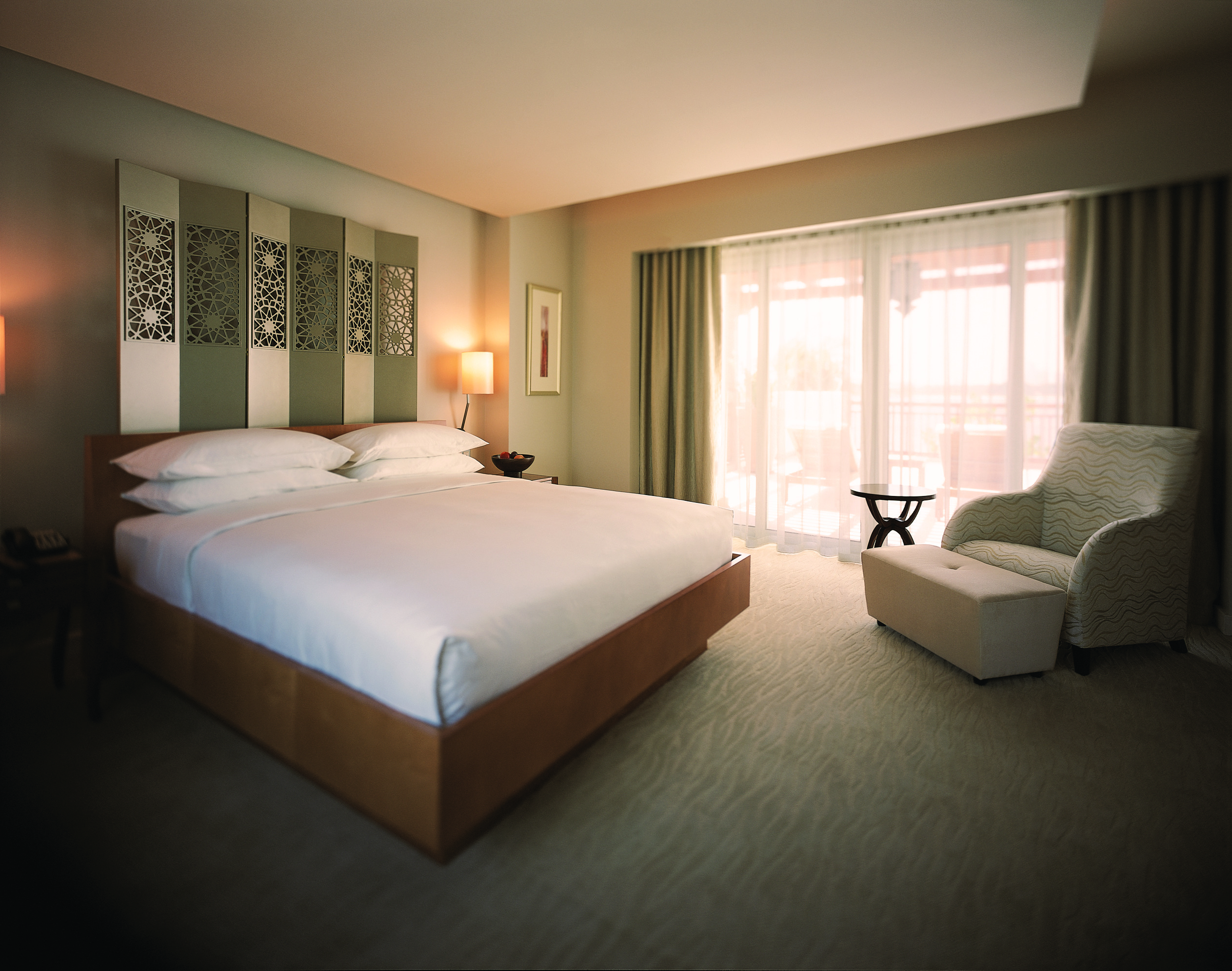 Park terrace suite with modern minimalistic decor, grey and white colour scheme and double bed