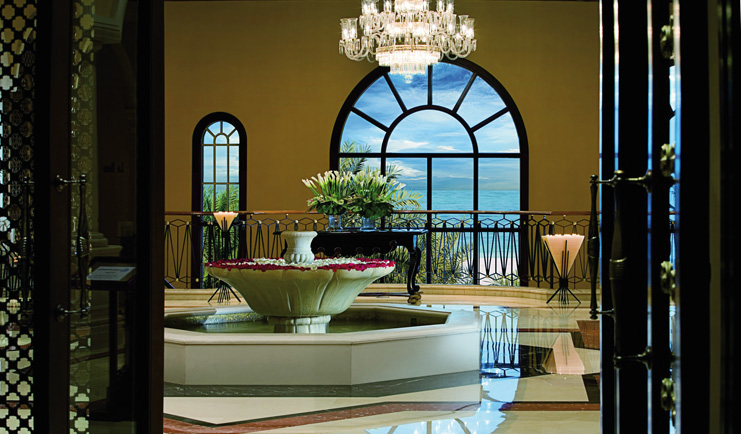 The Ritz-Carlton Dubai lobby view with fountain chandelier and sea view