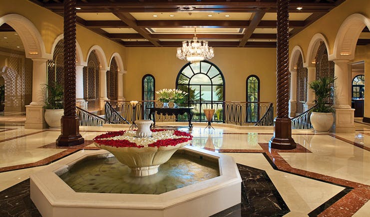 The Ritz-Carlton Dubai lobby with fountain and chandelier
