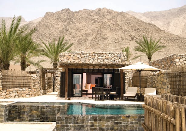 Six Senses Zighy Bay Oman pool villa mountain stone villa with private pool terrace and loungers and mountain view