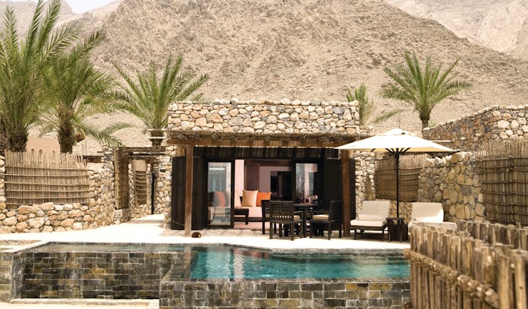 Six Senses Zighy Bay Oman pool villa mountain stone villa with private pool terrace and loungers and mountain view