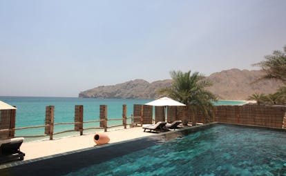 Six Senses Zighy Bay Oman private retreat pool with loungers and sea view