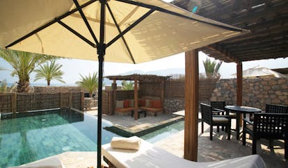 Six Senses Zighy Bay Oman villa pool with covered patio and loungers