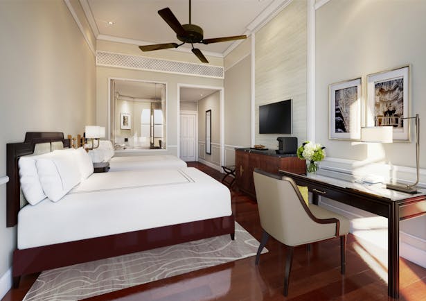 Raffles d'Angkor state room, double bed, desk, elegant decor in a colonial style
