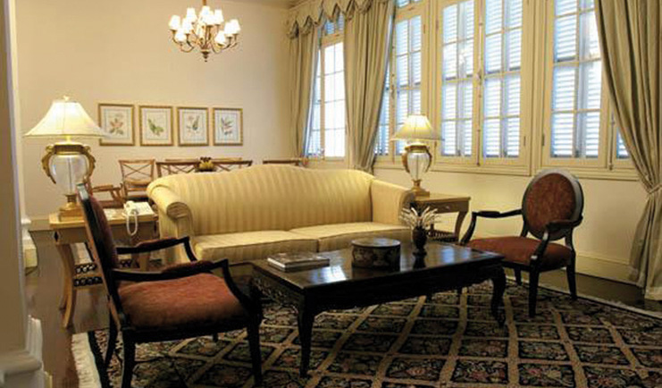 Raffles Hotel Le Royal Cambodia sitting room classic decor sofa chandelier