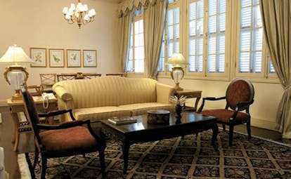 Raffles Hotel Le Royal Cambodia sitting room classic decor sofa chandelier