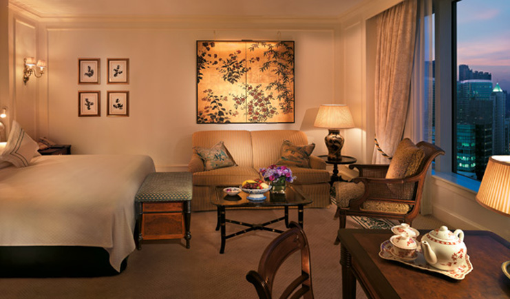 The Peninsula Hong Kong grand deluxe bedroom classic decor sitting area city view