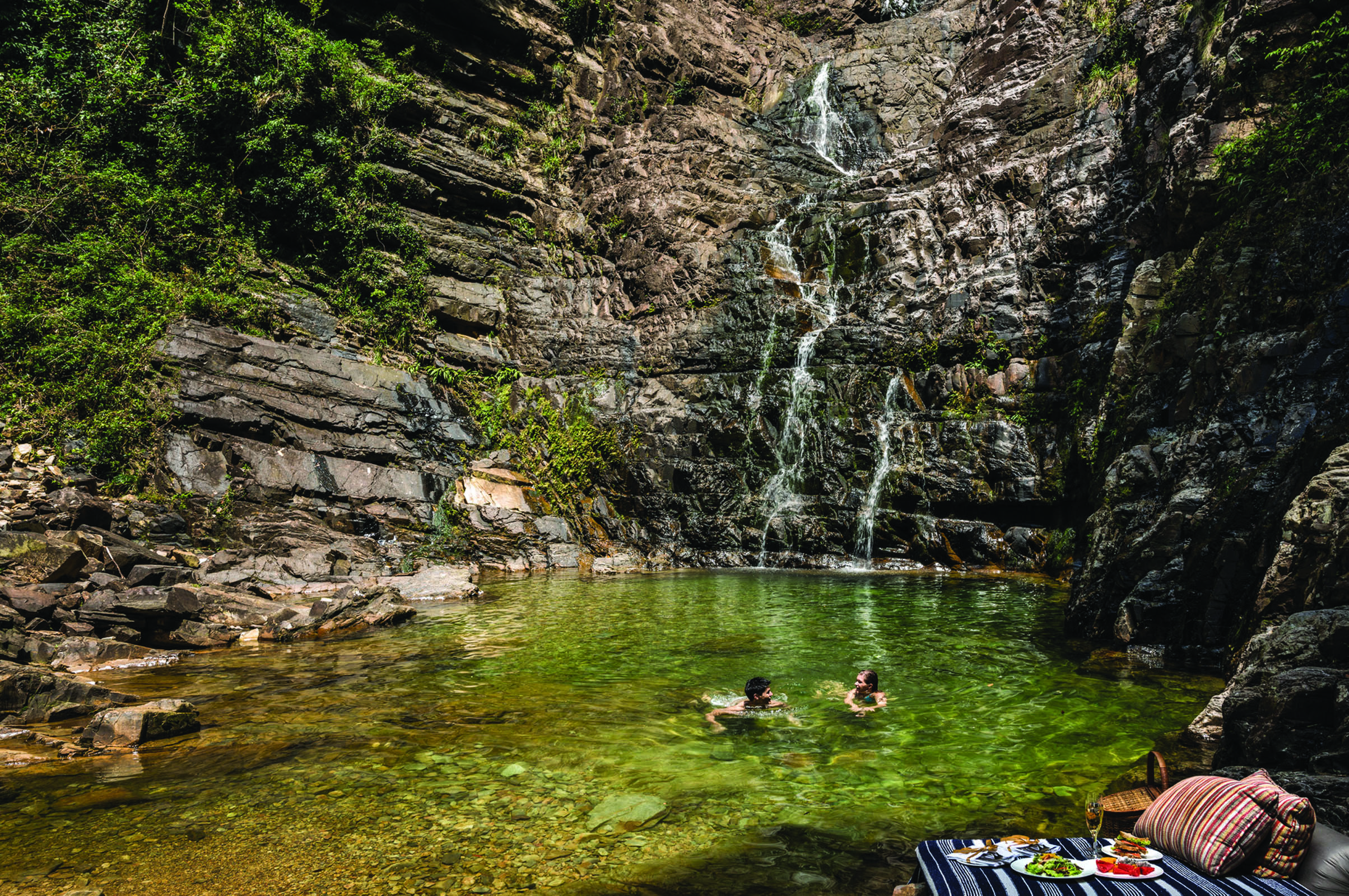 Four Seasons Langkawi Malaysia lagoon children swimming picnic surrounded by nature