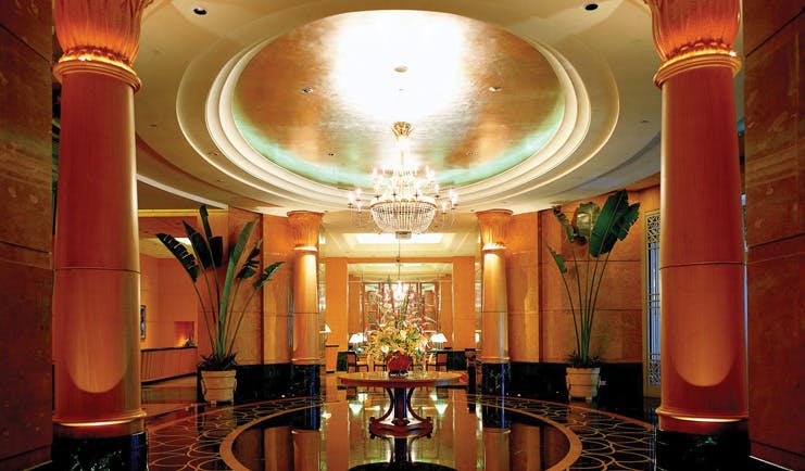 Mandarin Oriental Kuala Lumpur lobby ornate décor chandelier columns marble