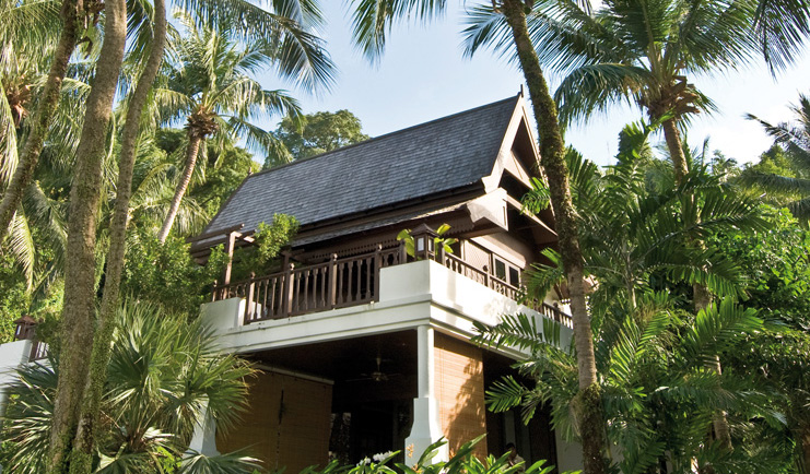 Pangkor Laut Malaysia garden villa exterior surrounded by trees and plantsw