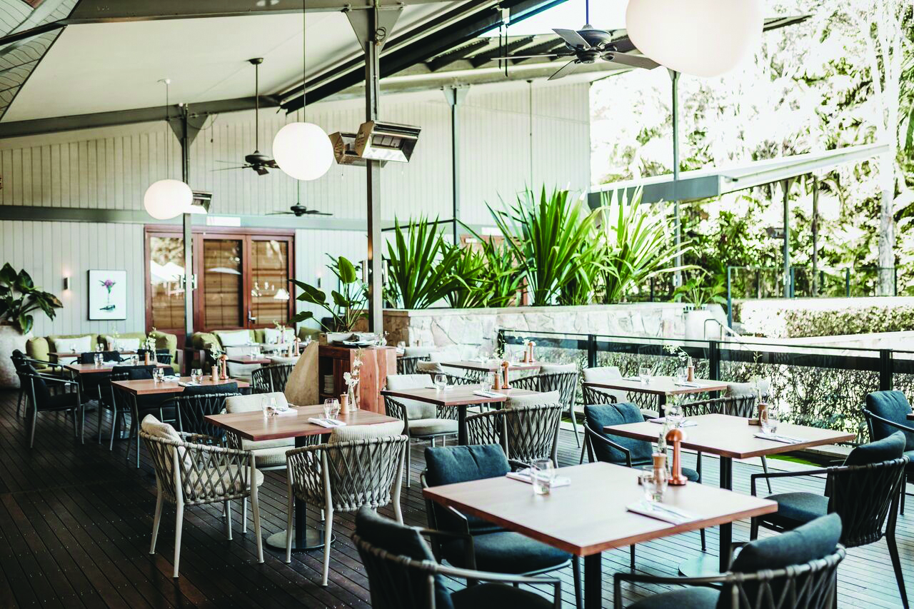 The Byron at Byron New South Wales restaurant covered outdoor dining area with trees 