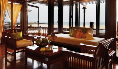 Tanjong Jara Malaysia Anjung suite lounge tables chairs windows overlooking beach