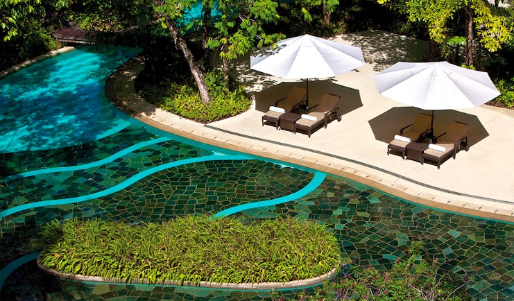 The Andaman Langkawi Malaysia pool terrace sun loungers umbrellas