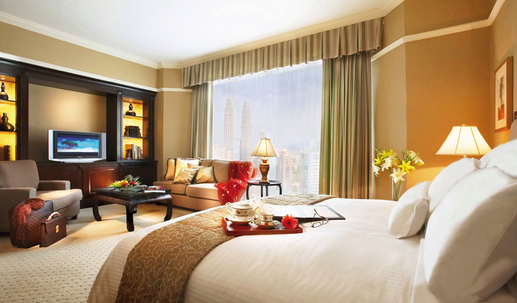 Ritz Carlton Kuala Lumpur deluxe guestroom bed sofa modern décor
