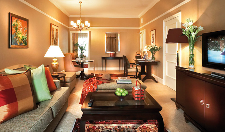 Ritz Carlton Kuala Lumpur premier suite lounge tables armchairs modern décor