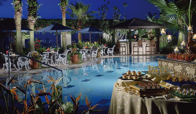 Four Seasons Singapore outdoor pool dining buffet bar area 