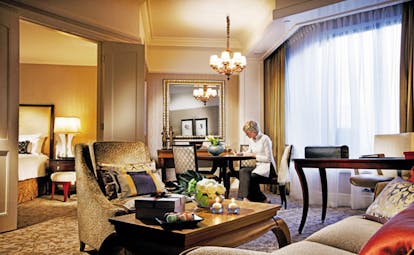 Four Seasons Singapore suite lounge writing desk view of bedroom