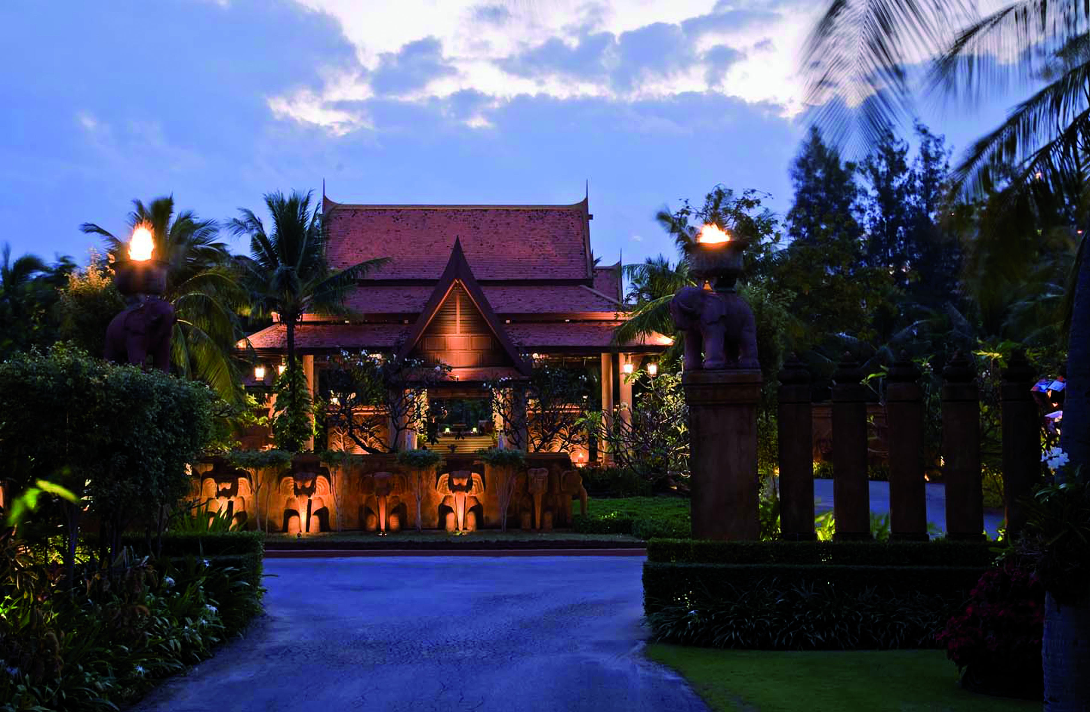 Anantara Hua Hin Thailand entrance at night traditional architecture lawns trees