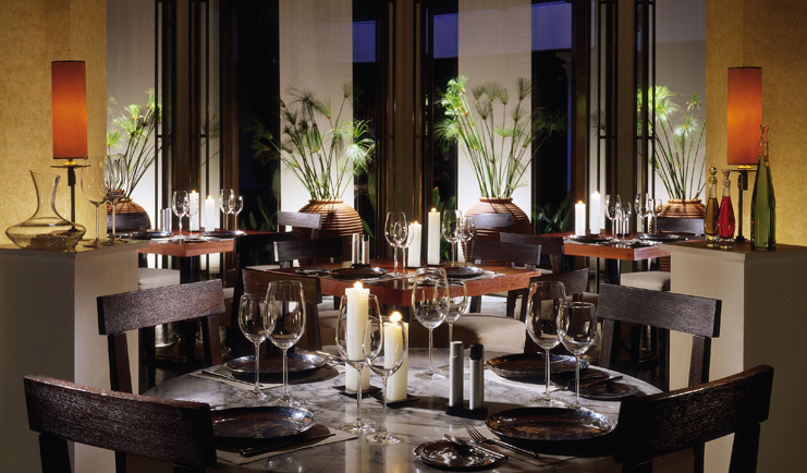 Anantara Siam Bangkok Thailand dining minimalist decor white candles urns with bamboo