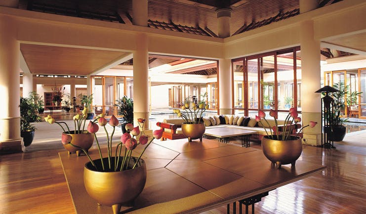 Banyan Tree Phuket Thailand lobby lounge area sofa flowers modern style