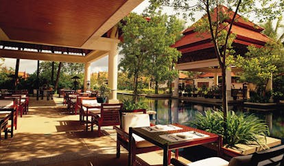 Banyan Tree Phuket Thailand Tamarind spa covered outdoor dining area pond pavilion view