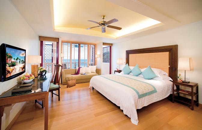 Centara Grand Beach Resort Thailand deluxe ocean facing bedroom bed sofa modern décor