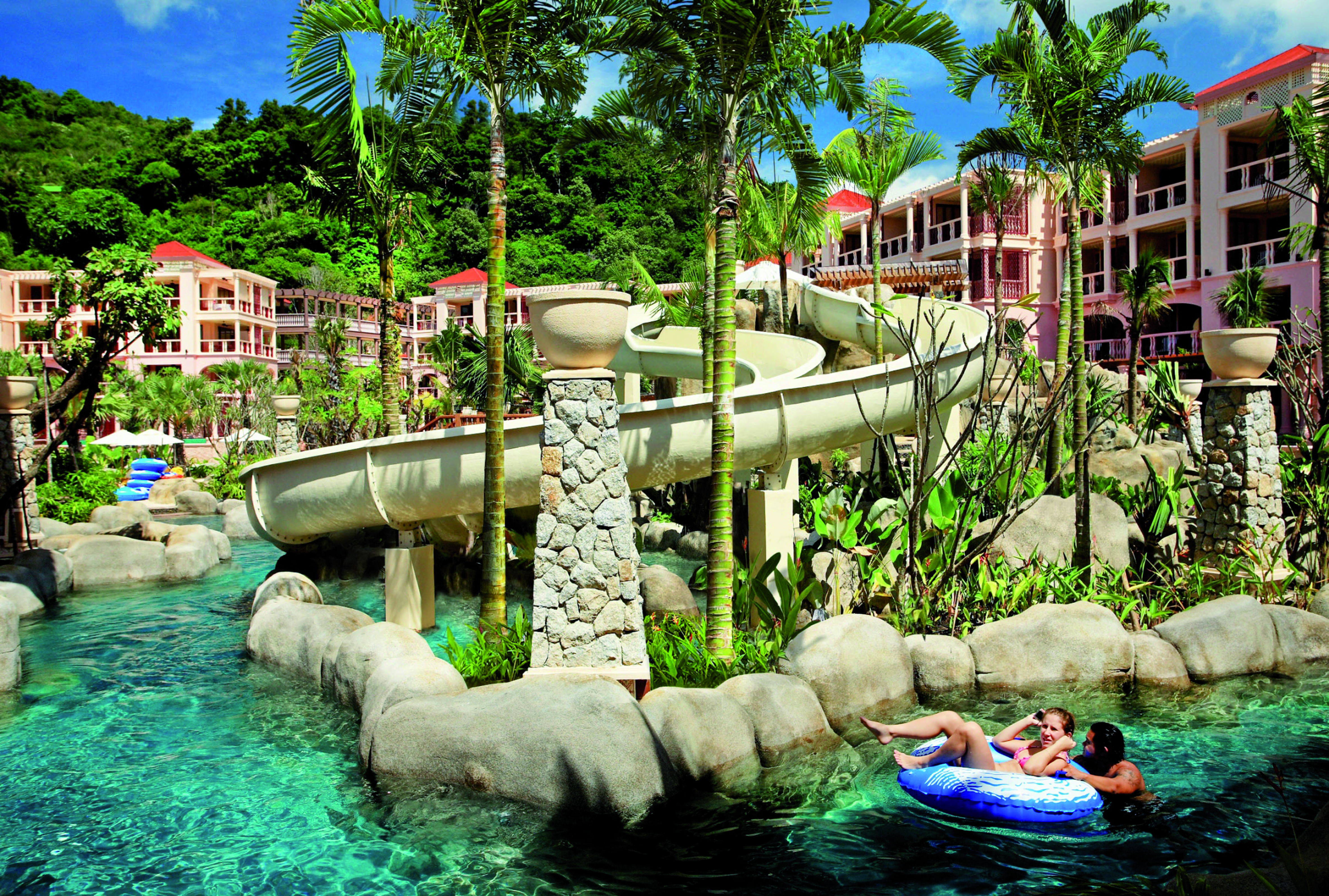 Centara Grand Beach Resort Thailand waterpark slides lazy river girl in dinghy