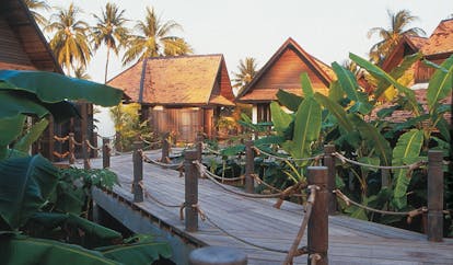 Evason Hua Hin Resort Thailand villa walkway decked path and greenery to villas