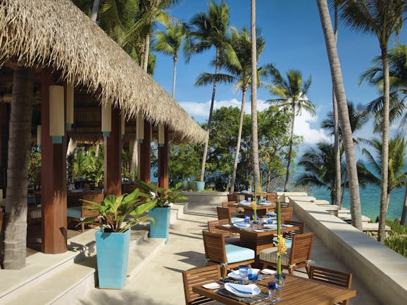 Four Seasons Koh Samui Thailand terrace outdoor dining area overlooking sea