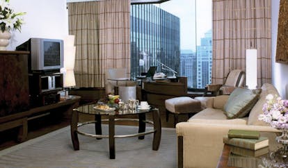 Grand Hyatt Erawan Bangkok Thailand grand suite lounge sofa desk panoramic city view