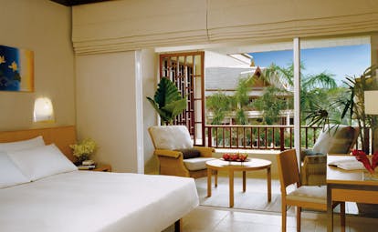 Hyatt Regency Hua Hin Thailand bedroom modern classic decor balcony with armchairs