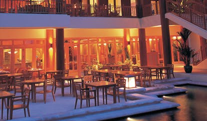 Hyatt Regency Hua Hin Thailand Figs restaurant indoor and outdoor dining area at night time