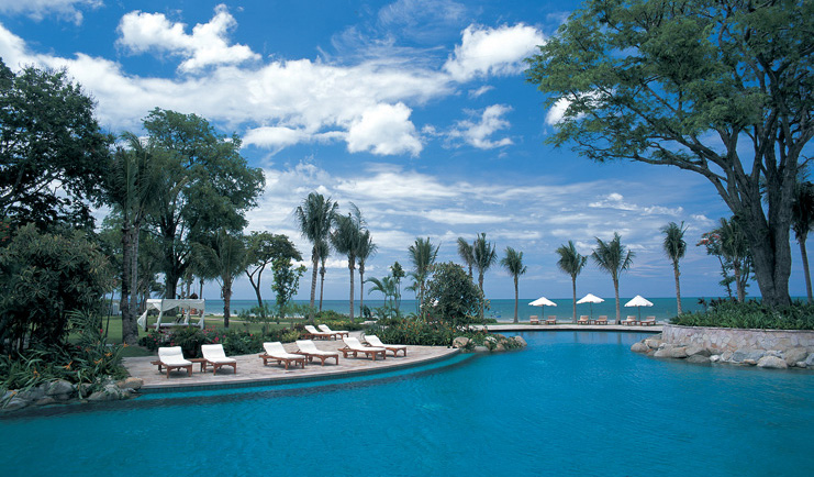Hyatt Regency Hua Hin Thailand lagoon pool loungers palm trees ocean view